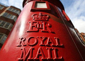 FILE - The U.K.'s 360-year-old postal service offers a majority stake to the public to help the company gain a competitive edge against European rivals. LONDON, ENGLAND - SEPTEMBER 12: A Royal Mail post box on September 12, 2013 in London, England. The Royal Mail will be privatised in the next few weeks the Government has announced. (Photo by Peter Macdiarmid/Getty Images)