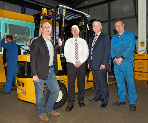 Yale 400K Handover – (l-r) Rod Hogg, logistics manager, Oxfam; Neil Turkington, trainer, Yale; Jonathan Bell MLA and Yale production operator Eddie Smart.