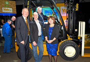 Yale 400K rolls of production at Craigavon (l-r) Harry Sands, managing director EMEA Hyster-Yale Group; Rod Hogg, logistics manager, Oxfam; Jonathan Bell MLA Minister of the Department of Enterprise Trade and Investment; and Alison Hopkinson, Oxfam finance director.