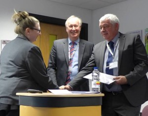 Laura Nelson md RTITB with Mike Williams CEO RTITB presents Denby transport, Terry Rose first ever RTITB certificate for train the trainer.